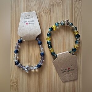 2x glass bead bracelets with elephant charm